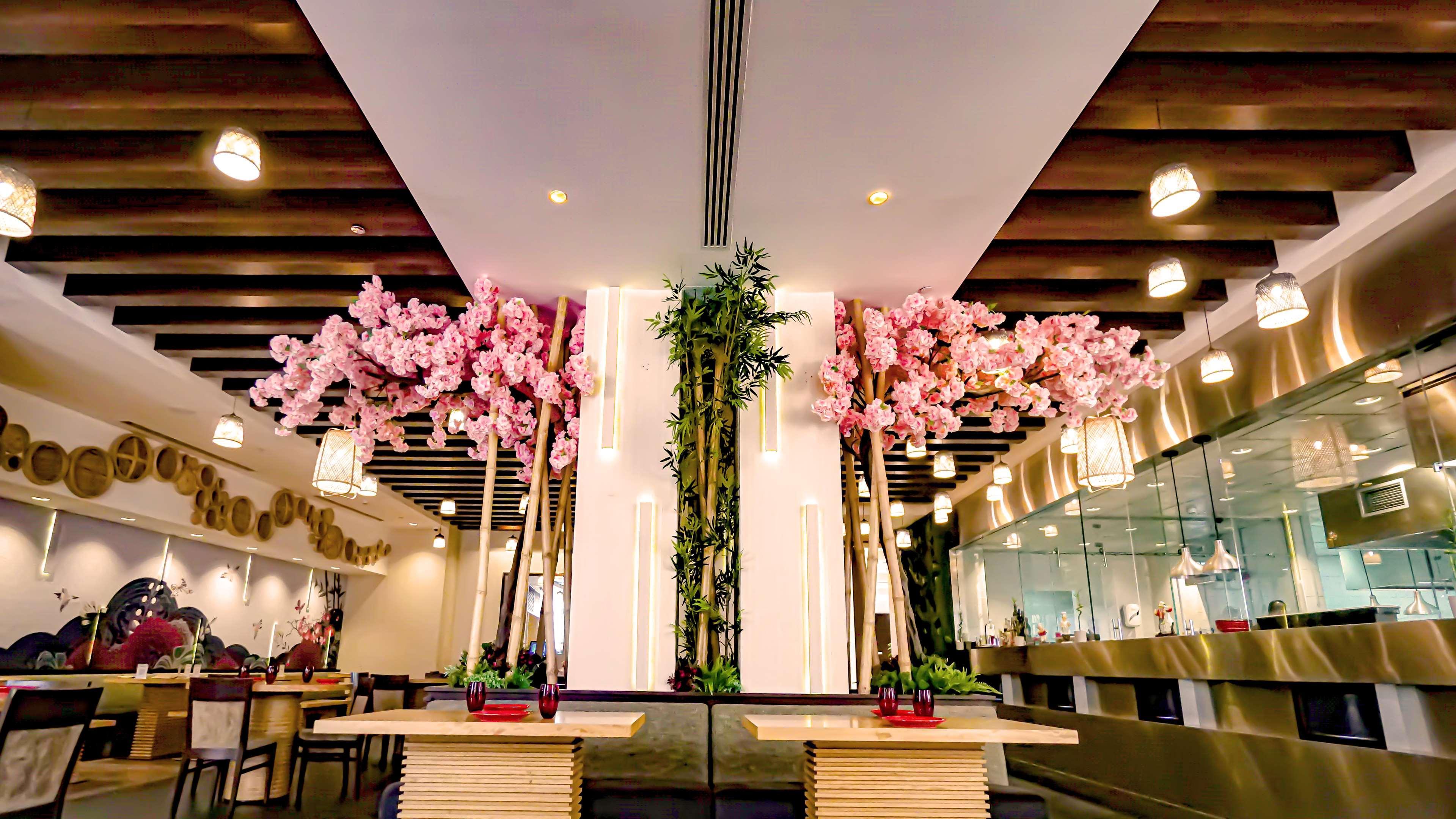 Отель Doubletree By Hilton Doha - Al Sadd Экстерьер фото Interior of a restaurant in the United Arab Emirates